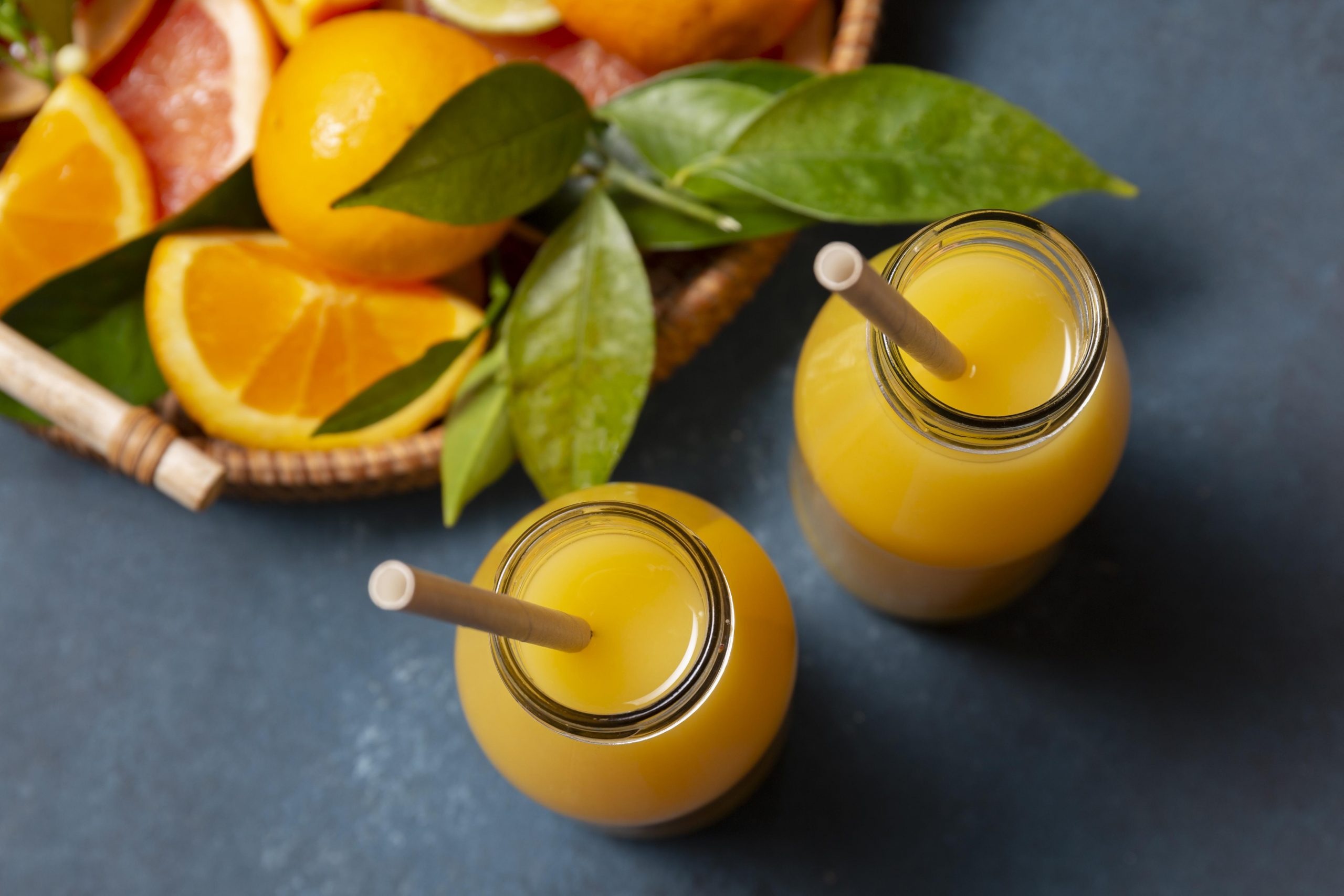 top view orange juice with citrus mix scaled 2